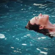 Woman swimming.