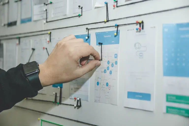 Person connecting pins using a nylon.