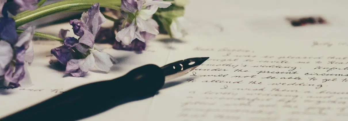 Written paper and a flower.