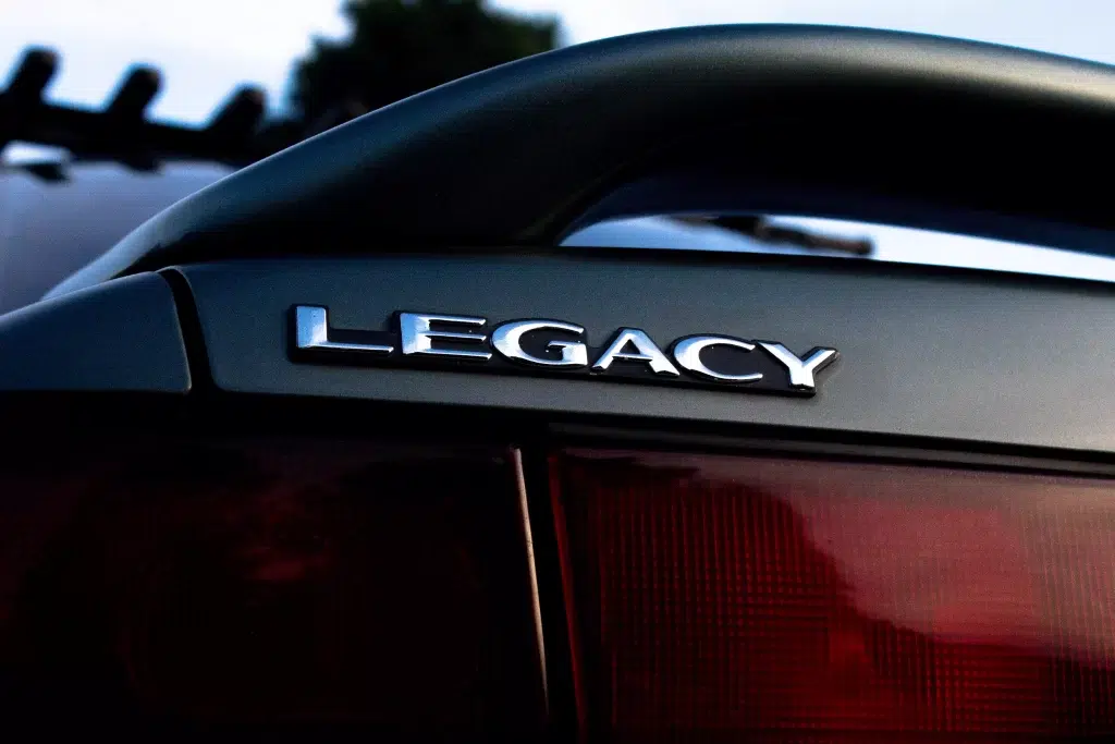 A car with the legacy at the back.
