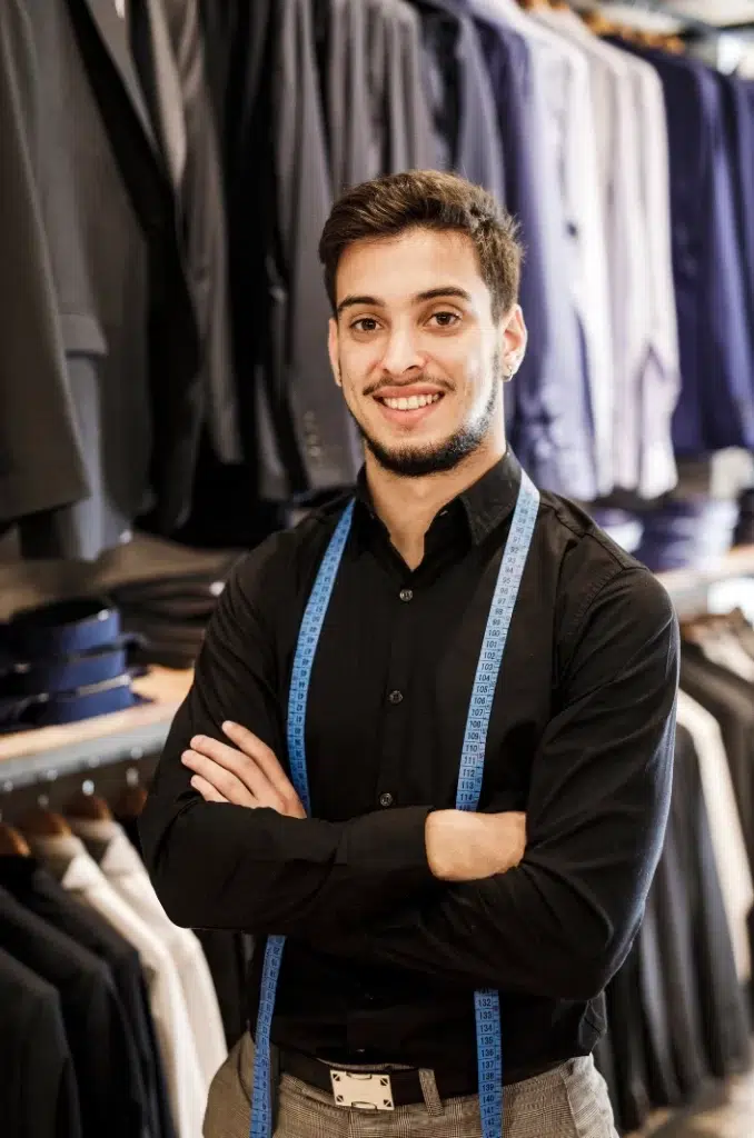 A businessman selling formal outfits for men.