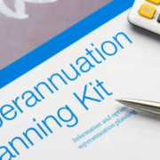 Superannuation planning kit with pen and calculator.