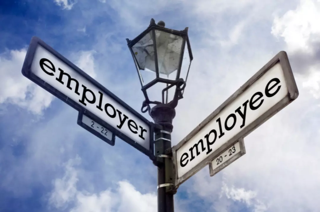 Employer and employee street sign.