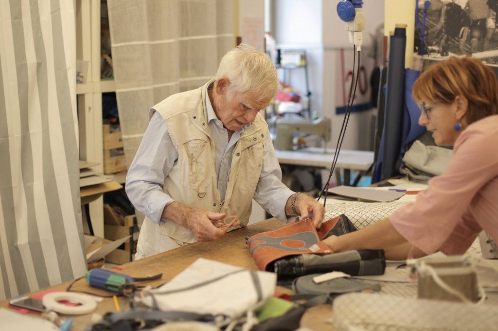 A senior man employed in the textile industry.