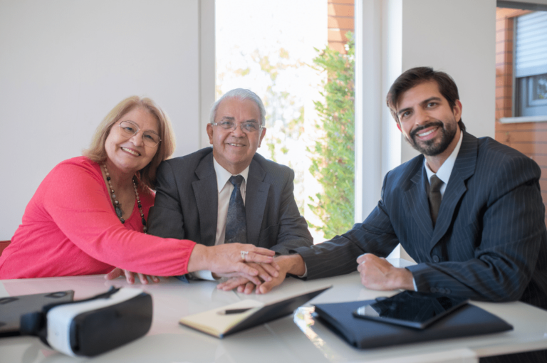 Financial Adviser meeting a senior couple.