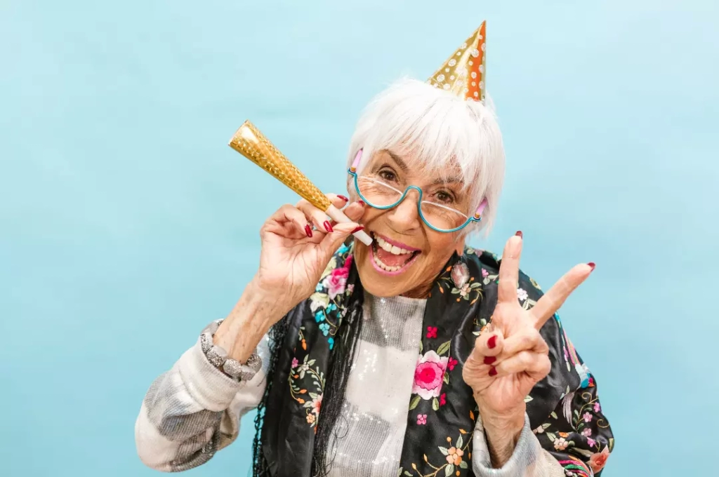 Happy senior woman celebrating her birthday.