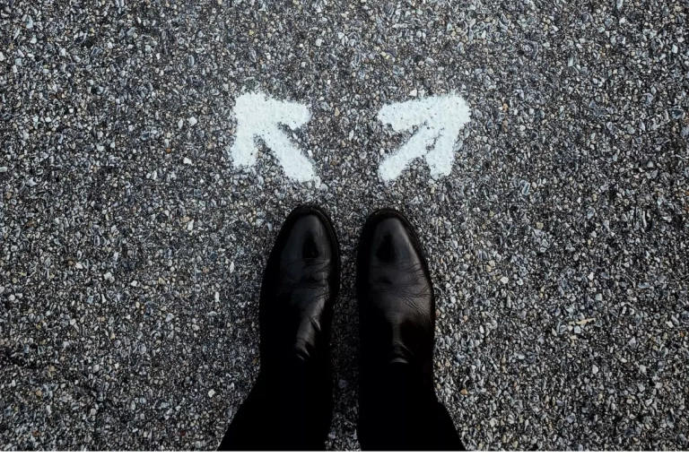 Person choosing what path to go.