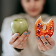 Choosing between apple and donut.